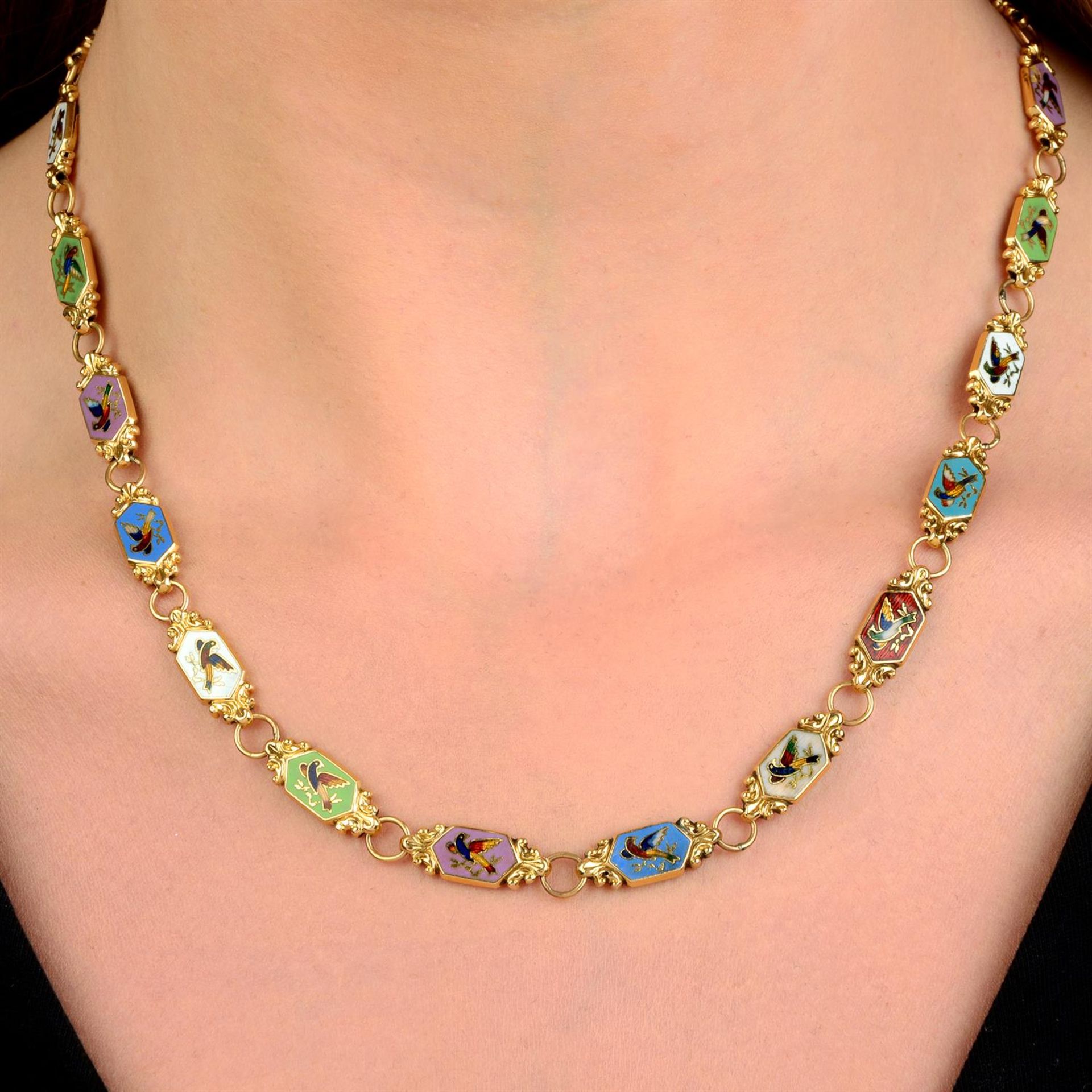 A mid 19th century gold and enamel bird motif necklace.