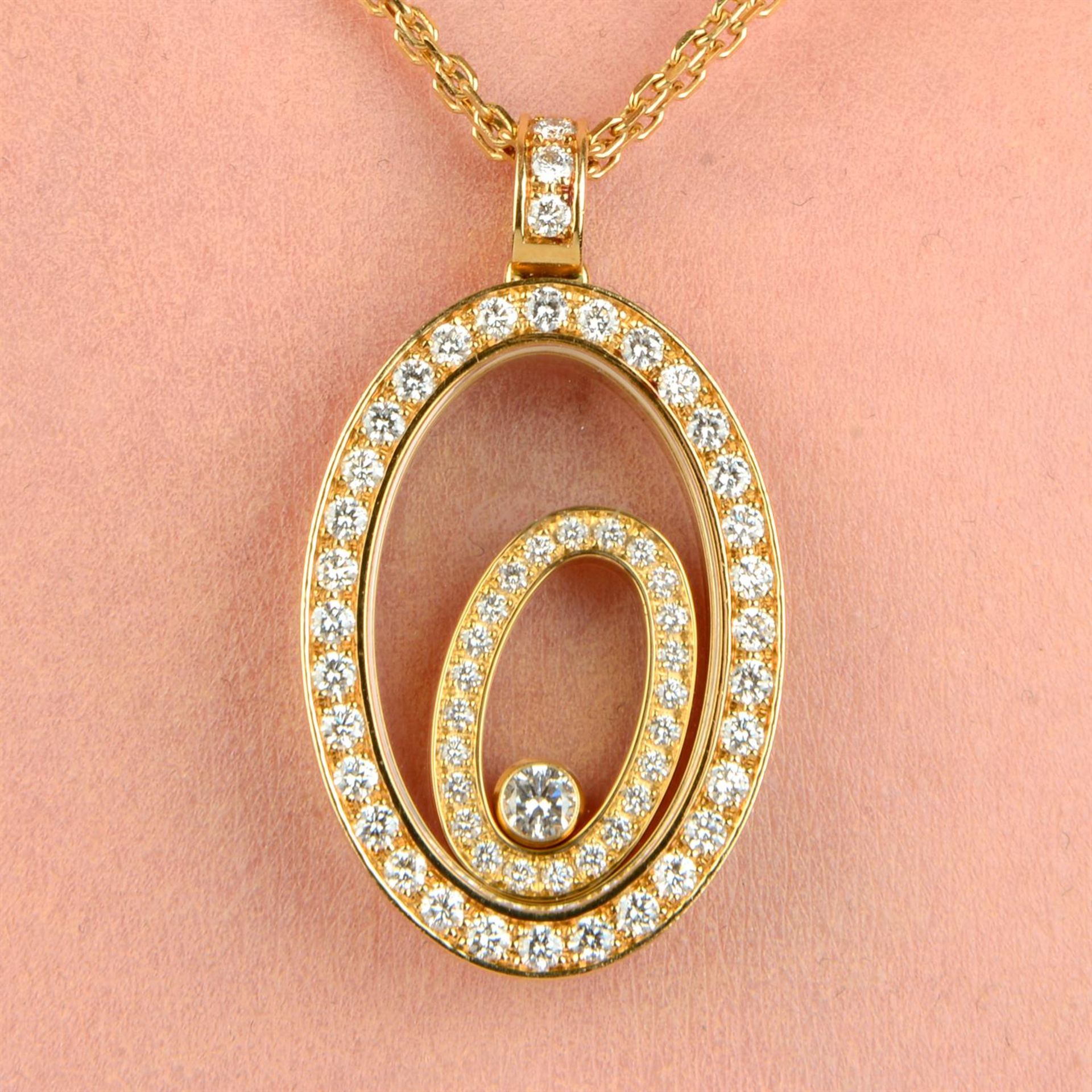An 18ct gold brilliant-cut diamond 'Happy Spirit' pendant, with two-row chain, by Chopard.