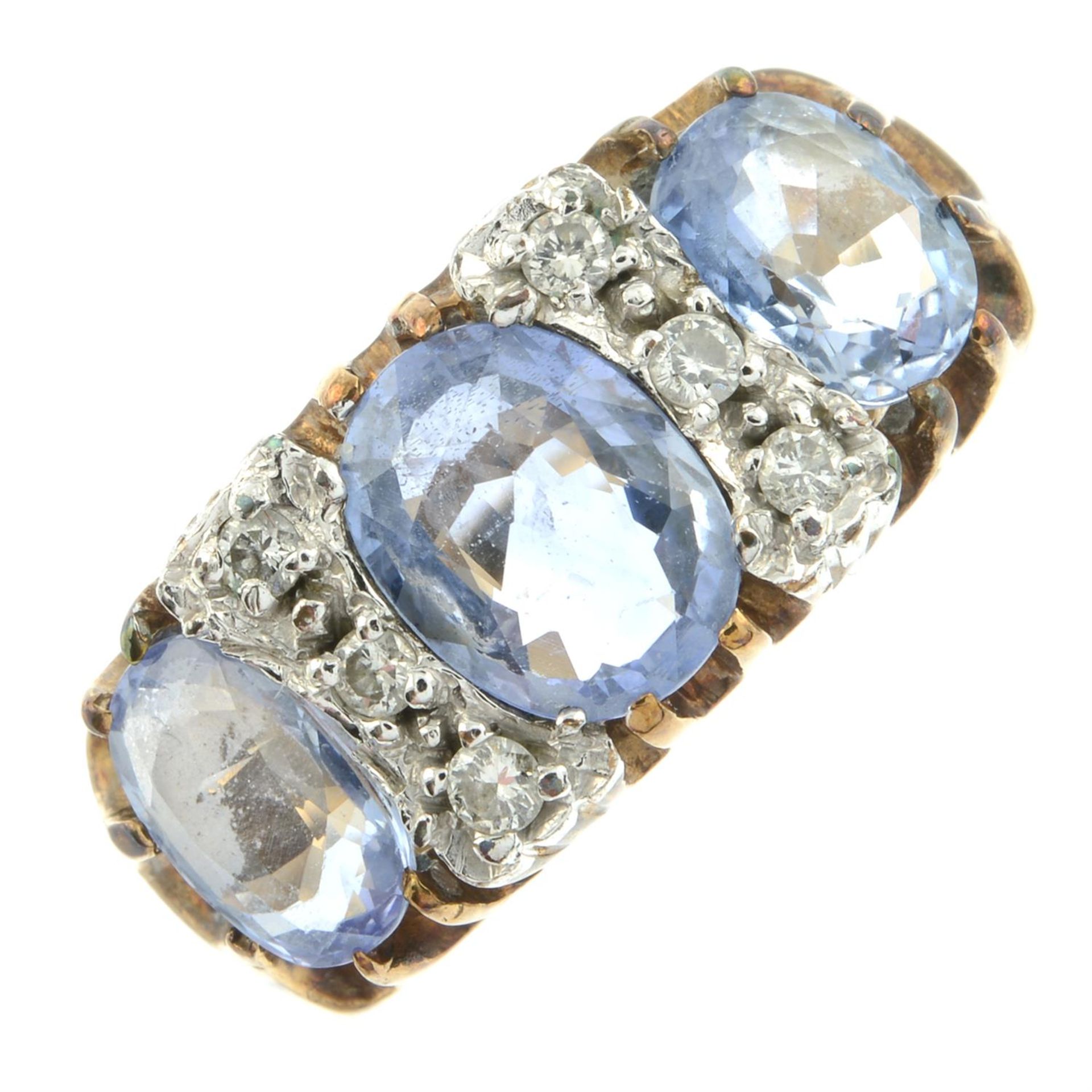 A 9ct gold sapphire three-stone ring, with brilliant-cut diamond spacers. - Image 2 of 5