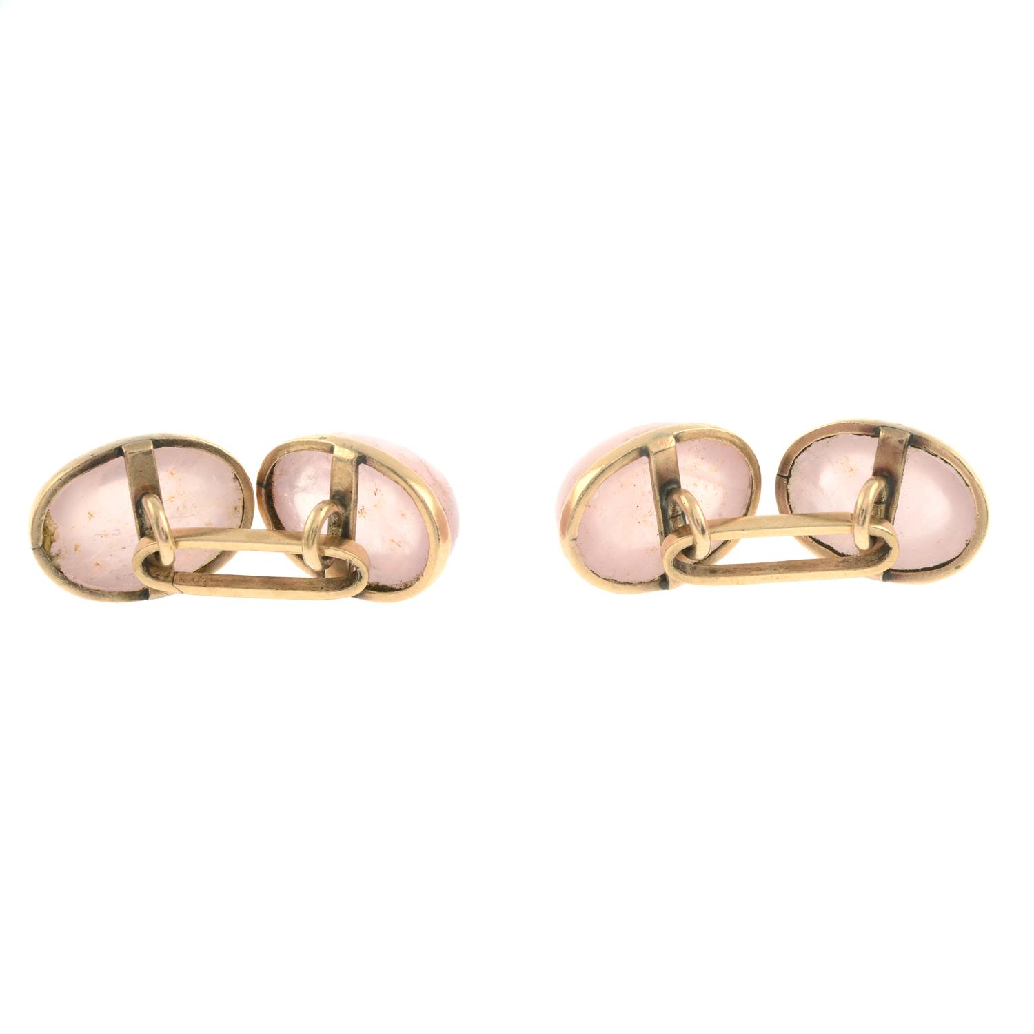 A pair of early to mid 20th century gold rose quartz cabochon cufflinks. - Image 3 of 3
