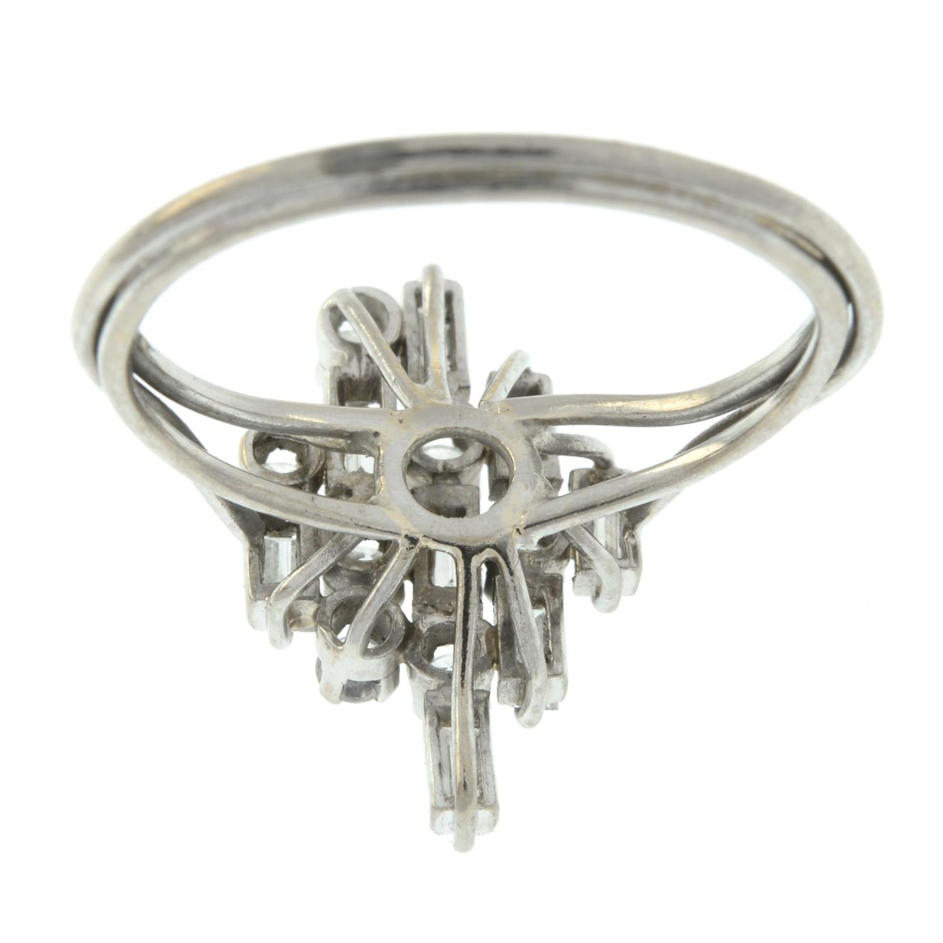 A mid 20th century platinum and gold brilliant and baguette-cut diamond dress ring. - Image 3 of 5