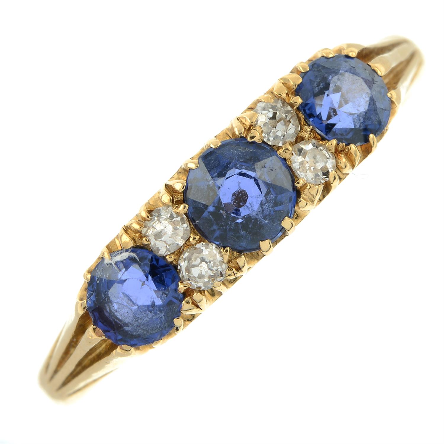 An early 20th century 18ct gold sapphire three-stone ring, with old-cut diamond double spacers. - Image 2 of 5