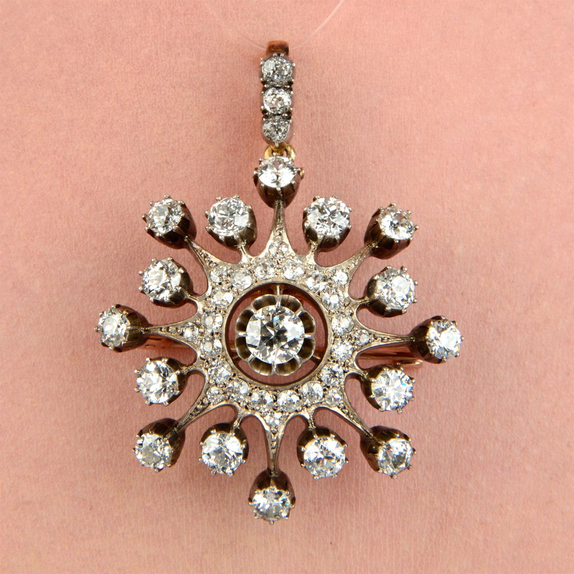 A late Victorian silver and gold old-cut diamond star pendant, with hair pin and brooch fittings.
