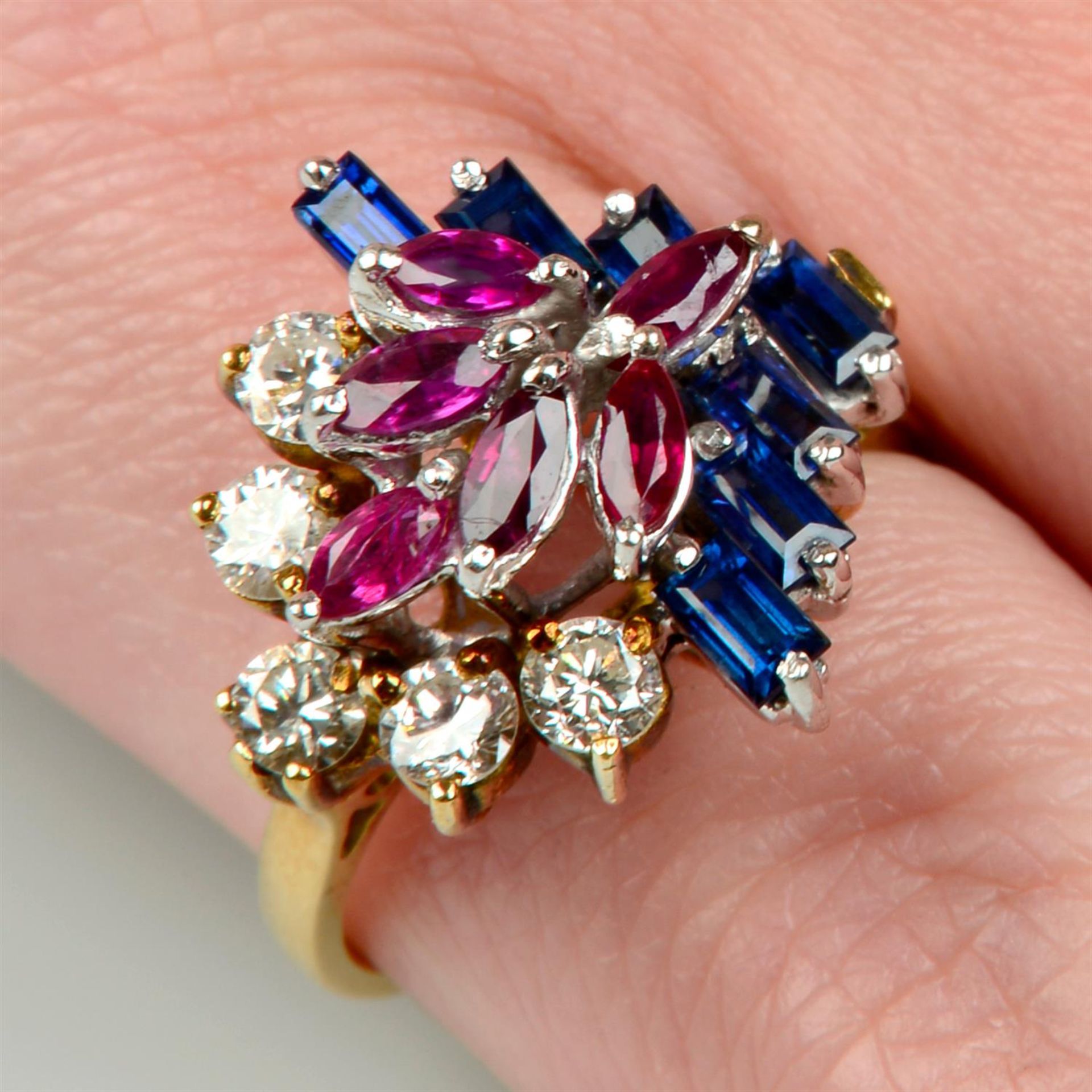 A mid 20th century 18ct gold sapphire, ruby and brilliant-cut diamond dress ring.