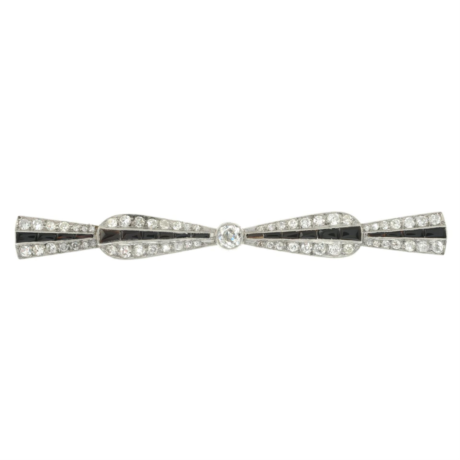 An Art Deco platinum, onyx old and single-cut diamond bow brooch. - Image 2 of 4