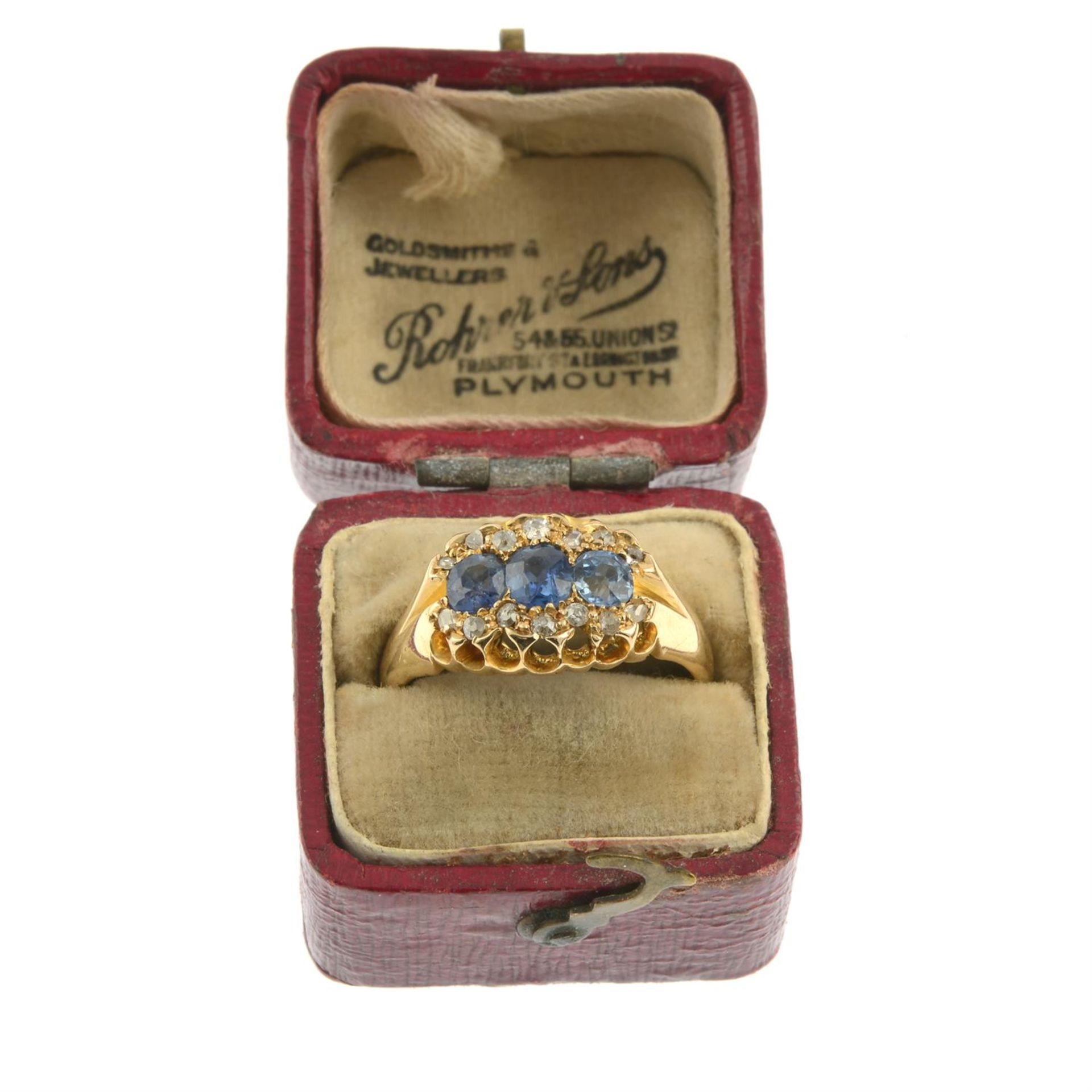 A late Victorian 18ct gold sapphire three-stone ring, with rose and old-cut diamond surround. - Image 5 of 6