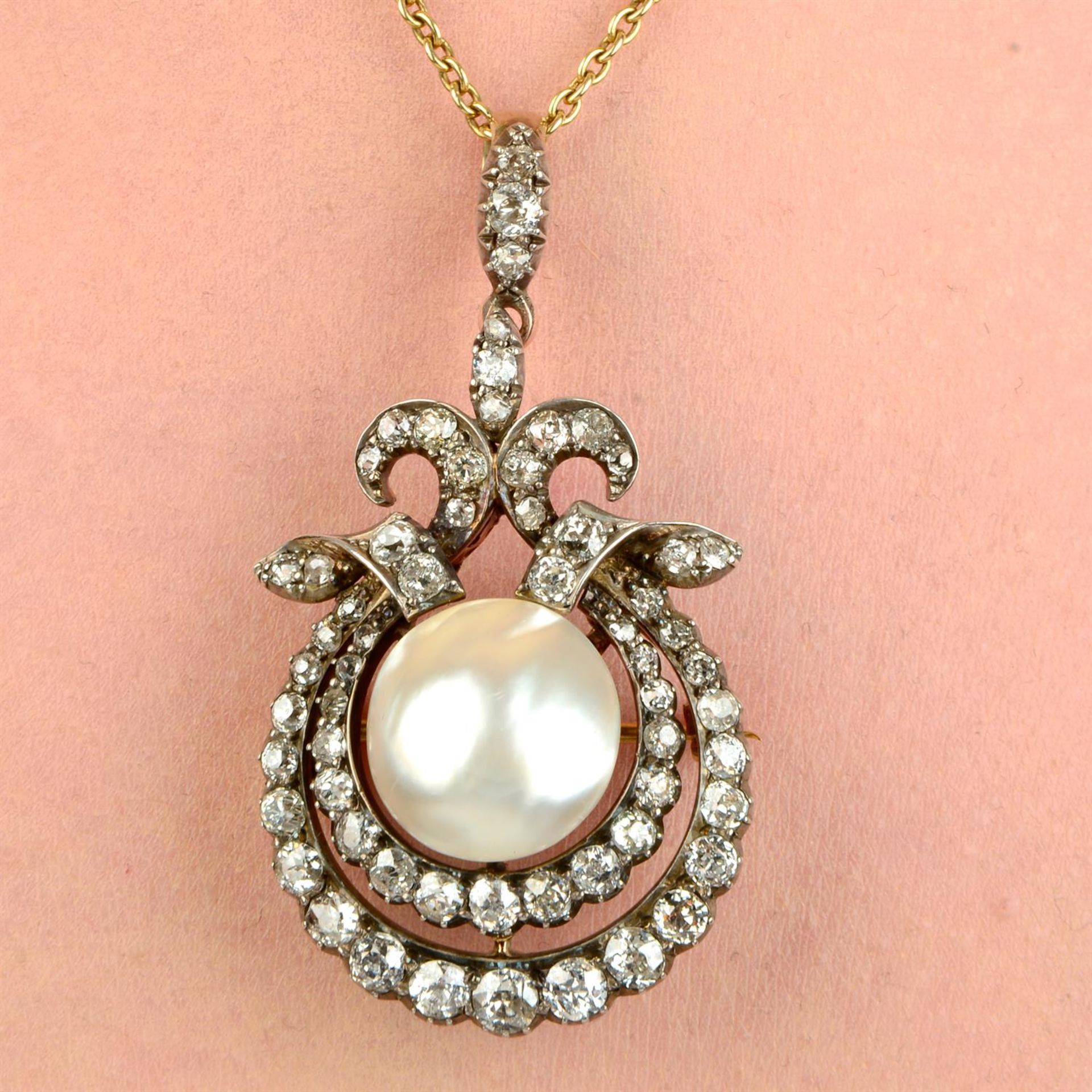 A late Victorian silver and gold, pearl and old-cut diamond pendant, with near-period 18ct gold