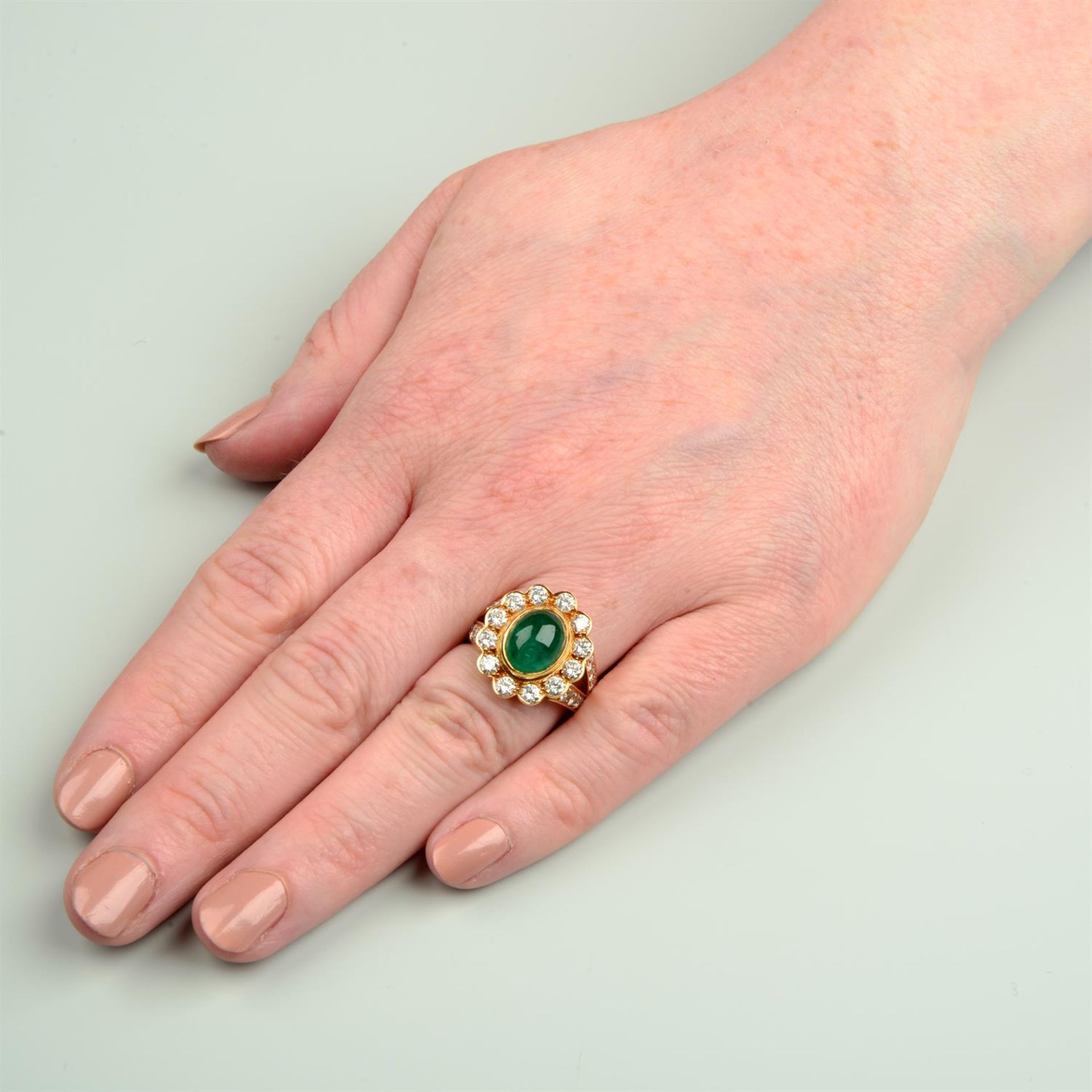 An 18ct gold emerald cabochon and brilliant-cut diamond cluster ring. - Image 5 of 5