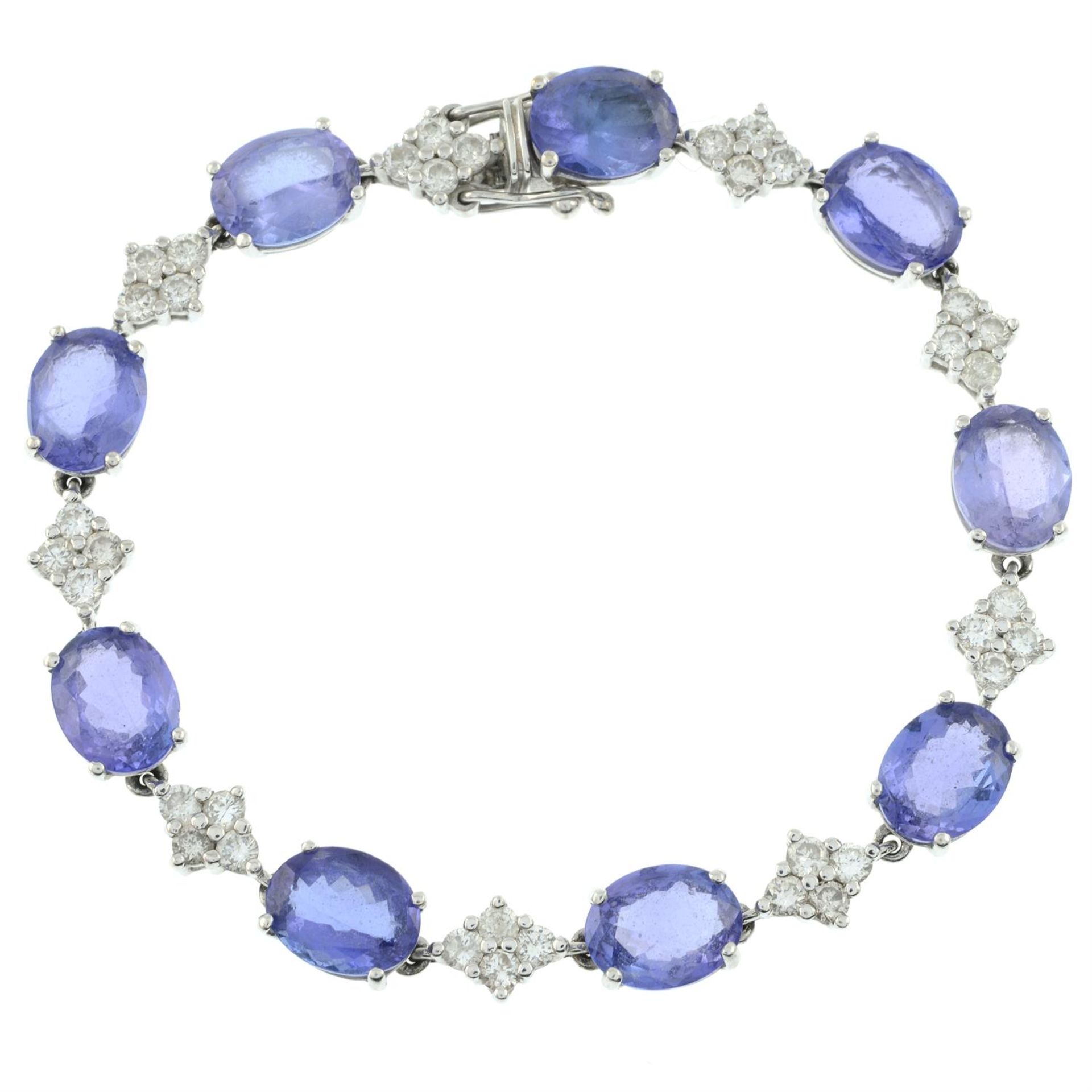 A tanzanite line bracelet, with brilliant-cut diamond quatrefoil spacers. - Image 2 of 3