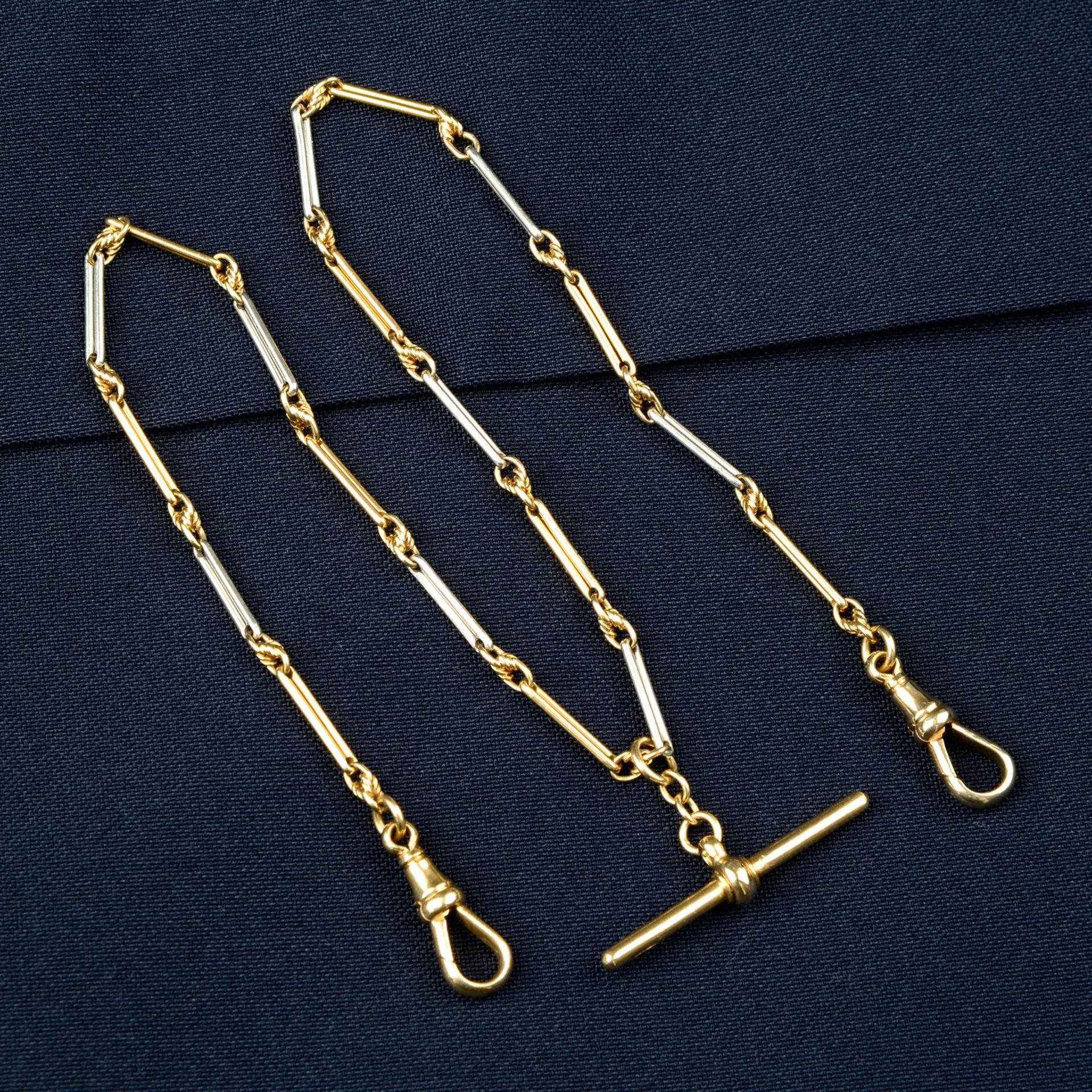 An early 20th century 18ct gold and platinum Albert chain, with T-bar and clasps.