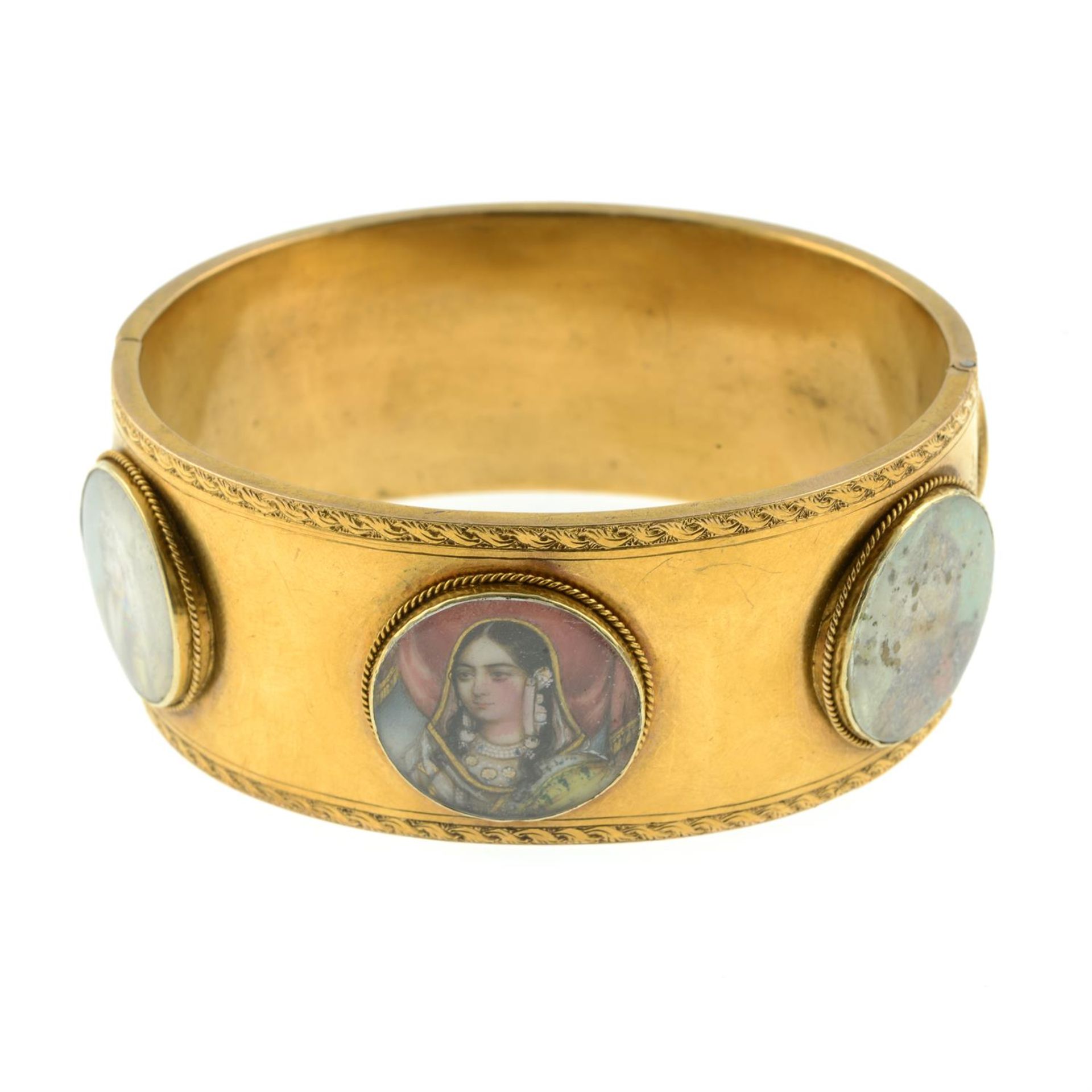 A mid 19th century gold hinged bangle, set with six Mughal portrait miniature glazed panels and - Bild 2 aus 3