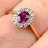 An early 20th century 18ct gold ruby and single-cut diamond cluster ring.