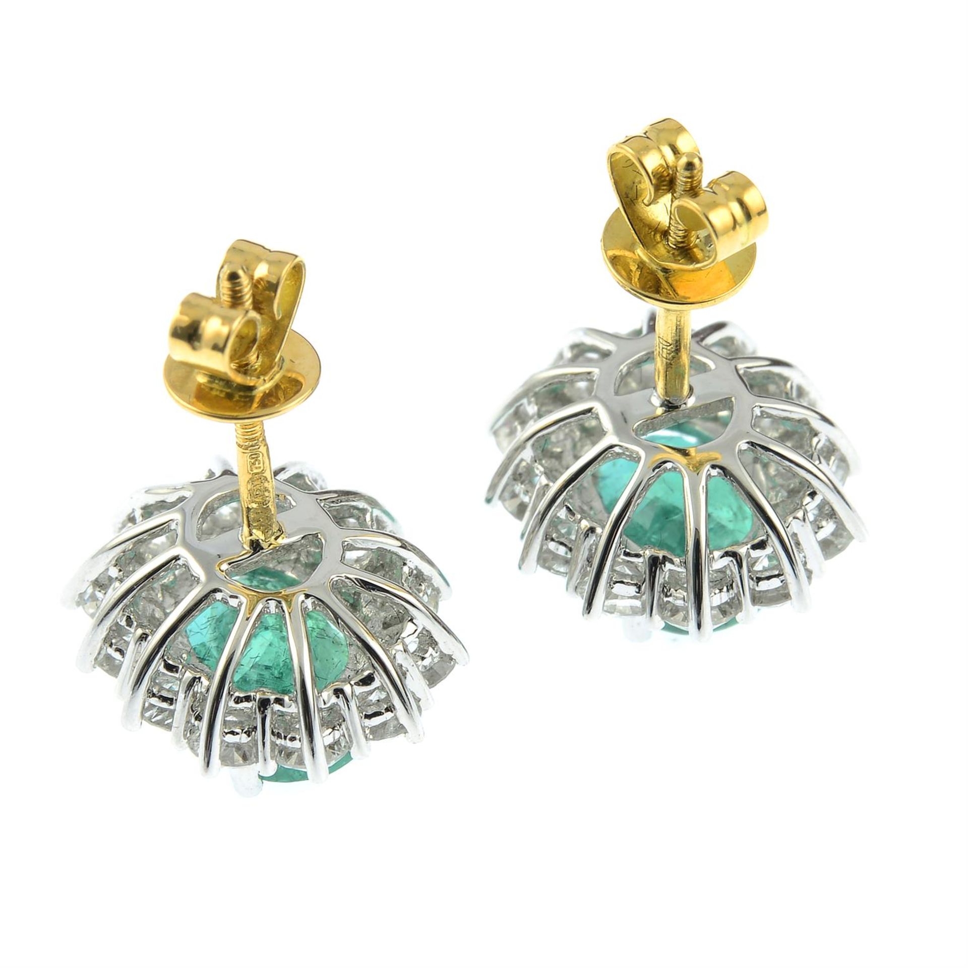 A pair of 18ct gold emerald and brilliant-cut diamond cluster earrings. - Image 3 of 3