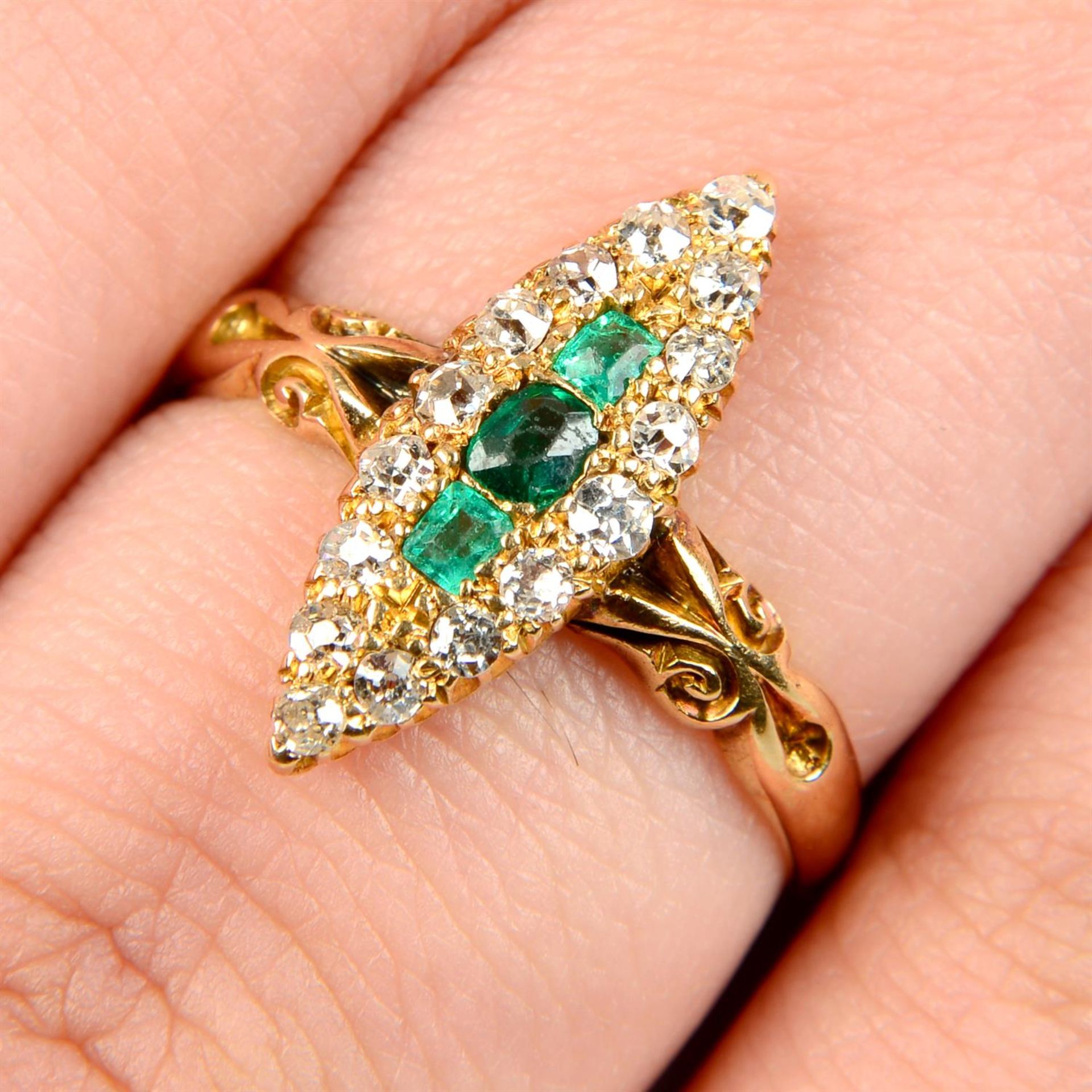 A late Victorian gold green garnet-topped-doublet, emerald and diamond marquise-shape cluster ring,