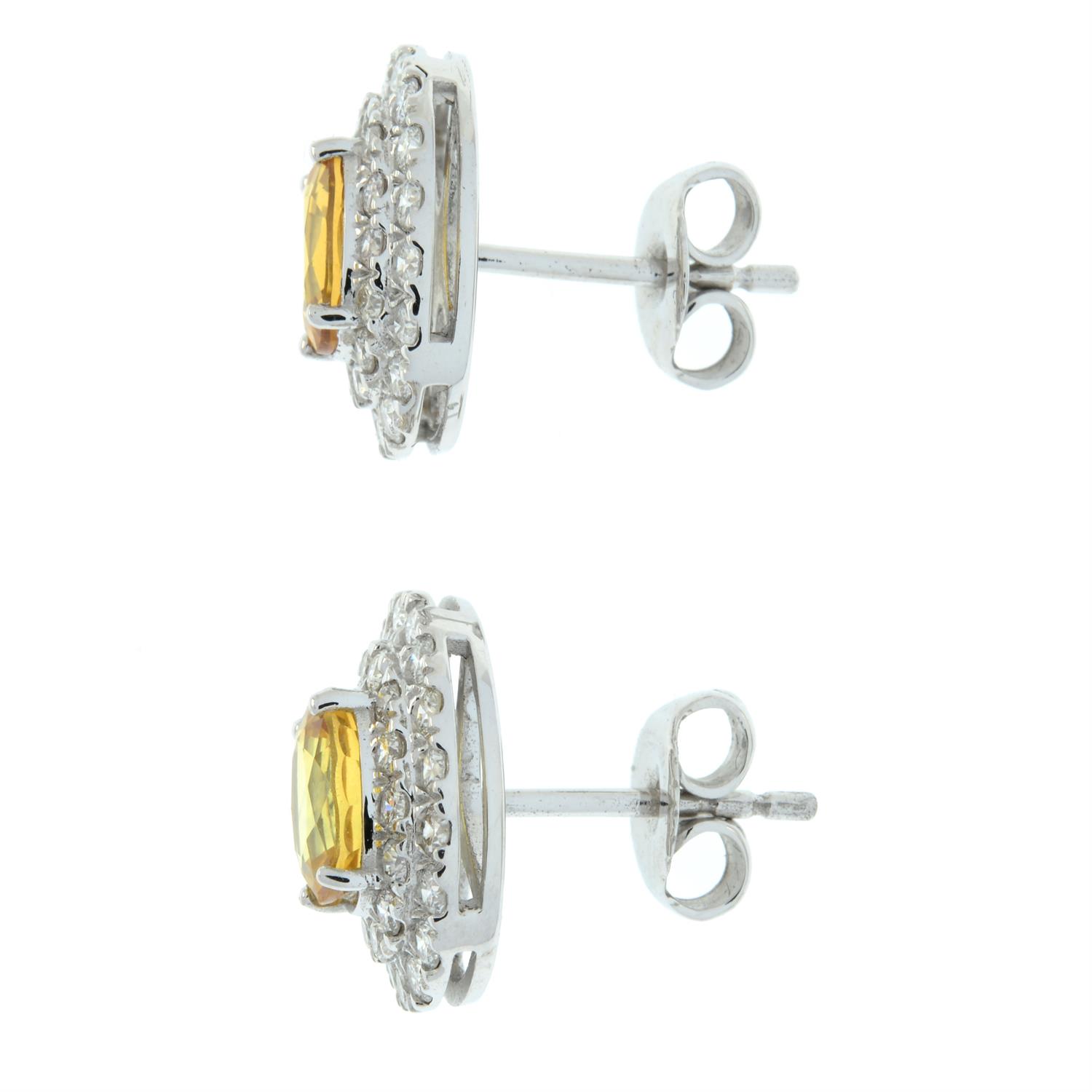 A pair of yellow sapphire and pave-set brilliant-cut diamond cluster earrings. - Image 4 of 4