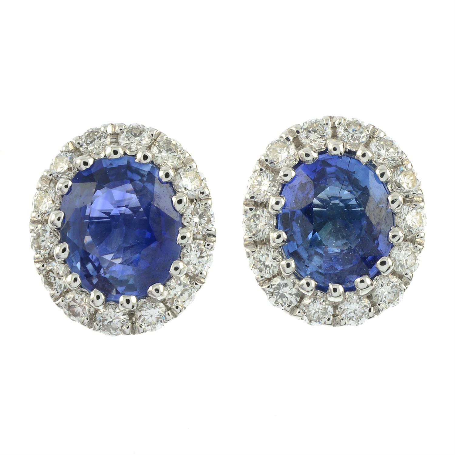 A pair of 18ct gold sapphire and brilliant-cut diamond cluster earrings. - Image 2 of 3