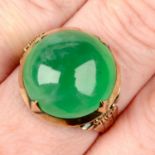 A mid 20th century 14ct gold A-type jadeite jade cabochon ring.