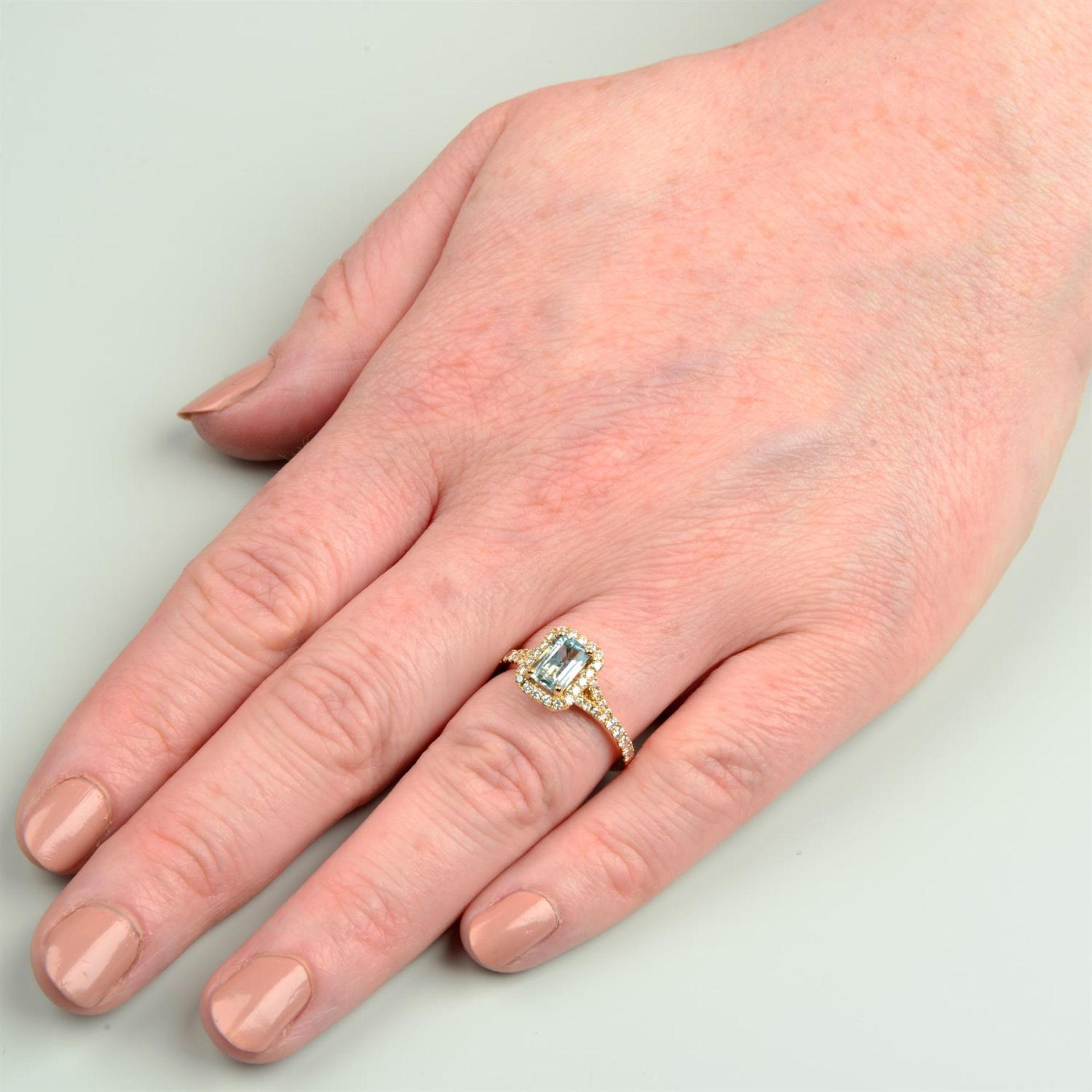 An 18ct gold aquamarine and brilliant-cut diamond dress ring. - Image 5 of 5