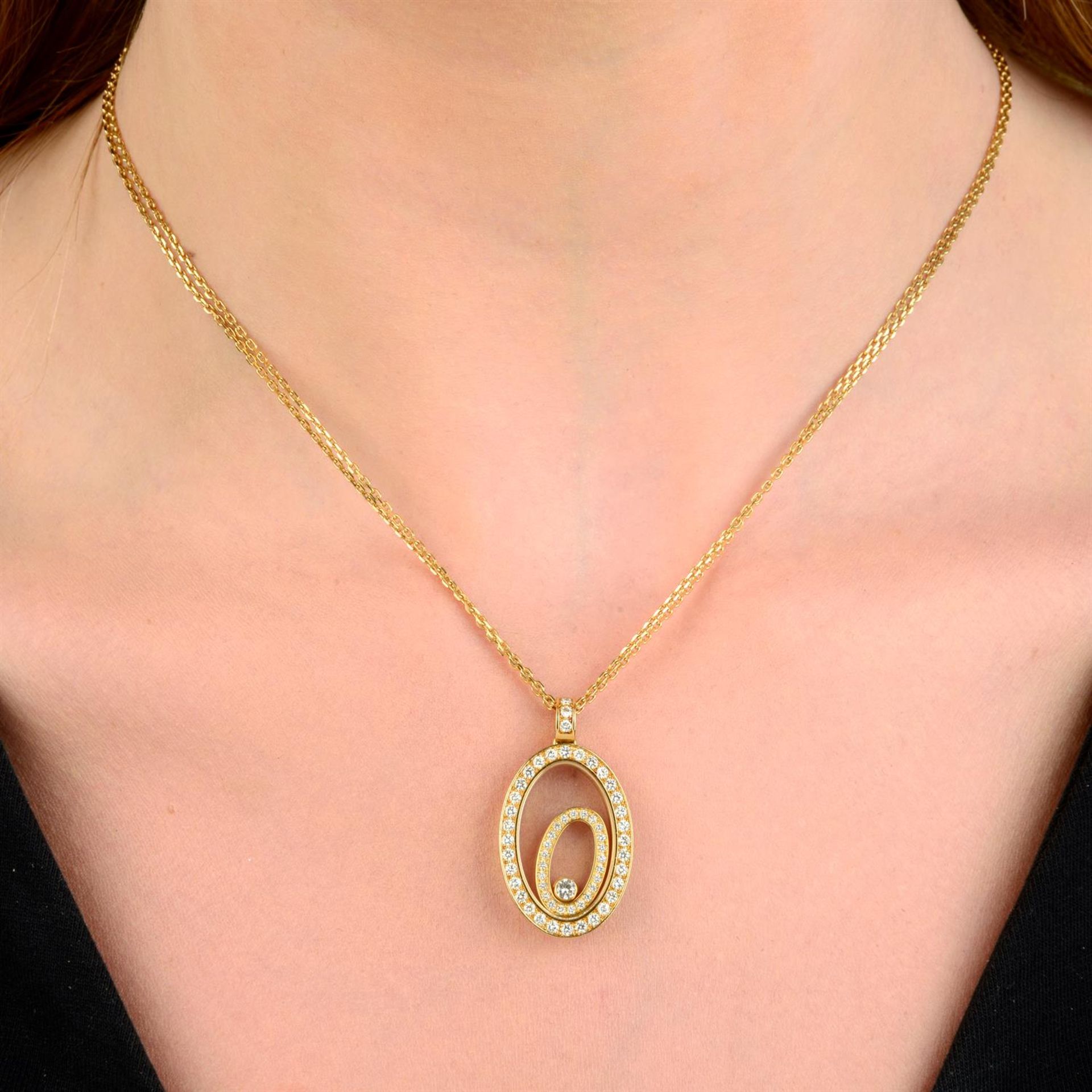 An 18ct gold brilliant-cut diamond 'Happy Spirit' pendant, with two-row chain, by Chopard. - Image 5 of 5