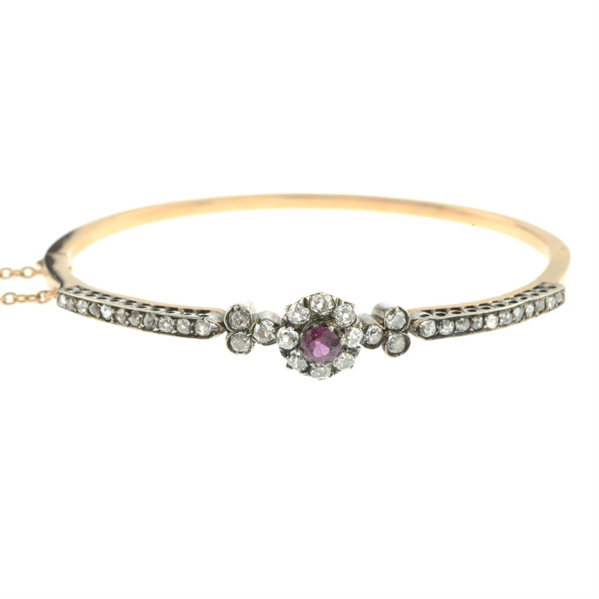 A late Victorian silver and 18ct gold, garnet old and rose-cut diamond hinged bangle. - Image 2 of 3