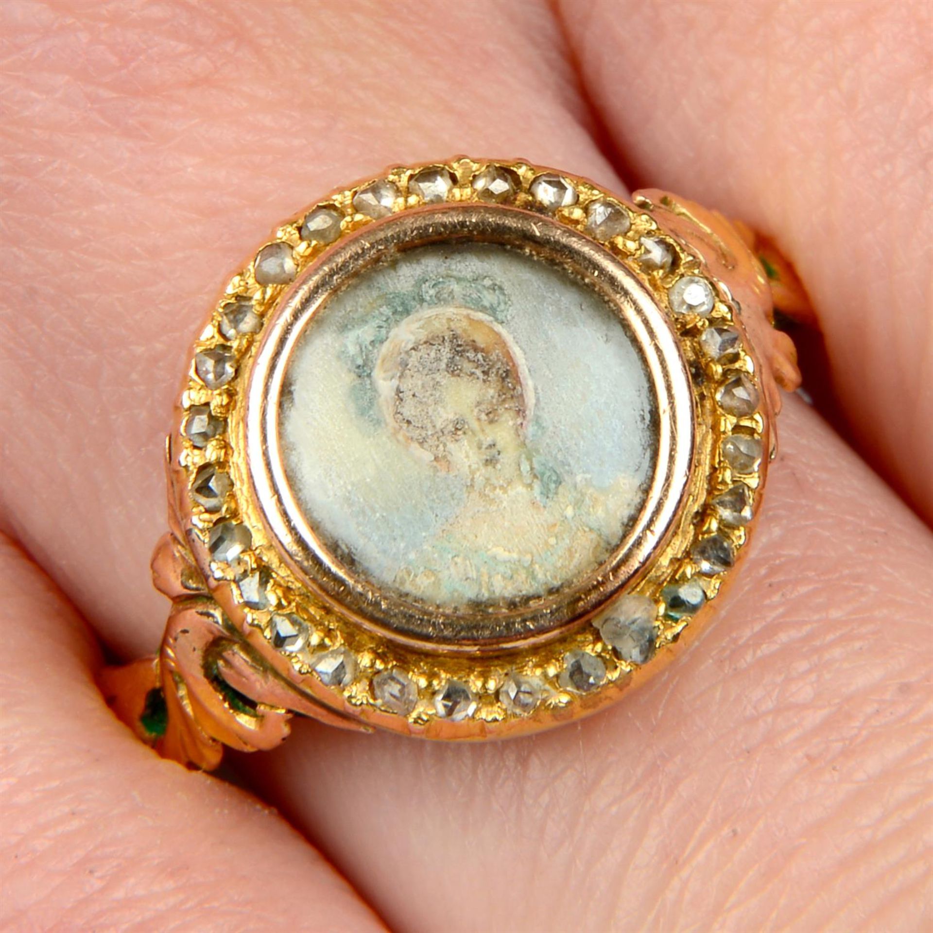 A late 19th century gold portrait miniature ring, with rose-cut diamond surround and replacement