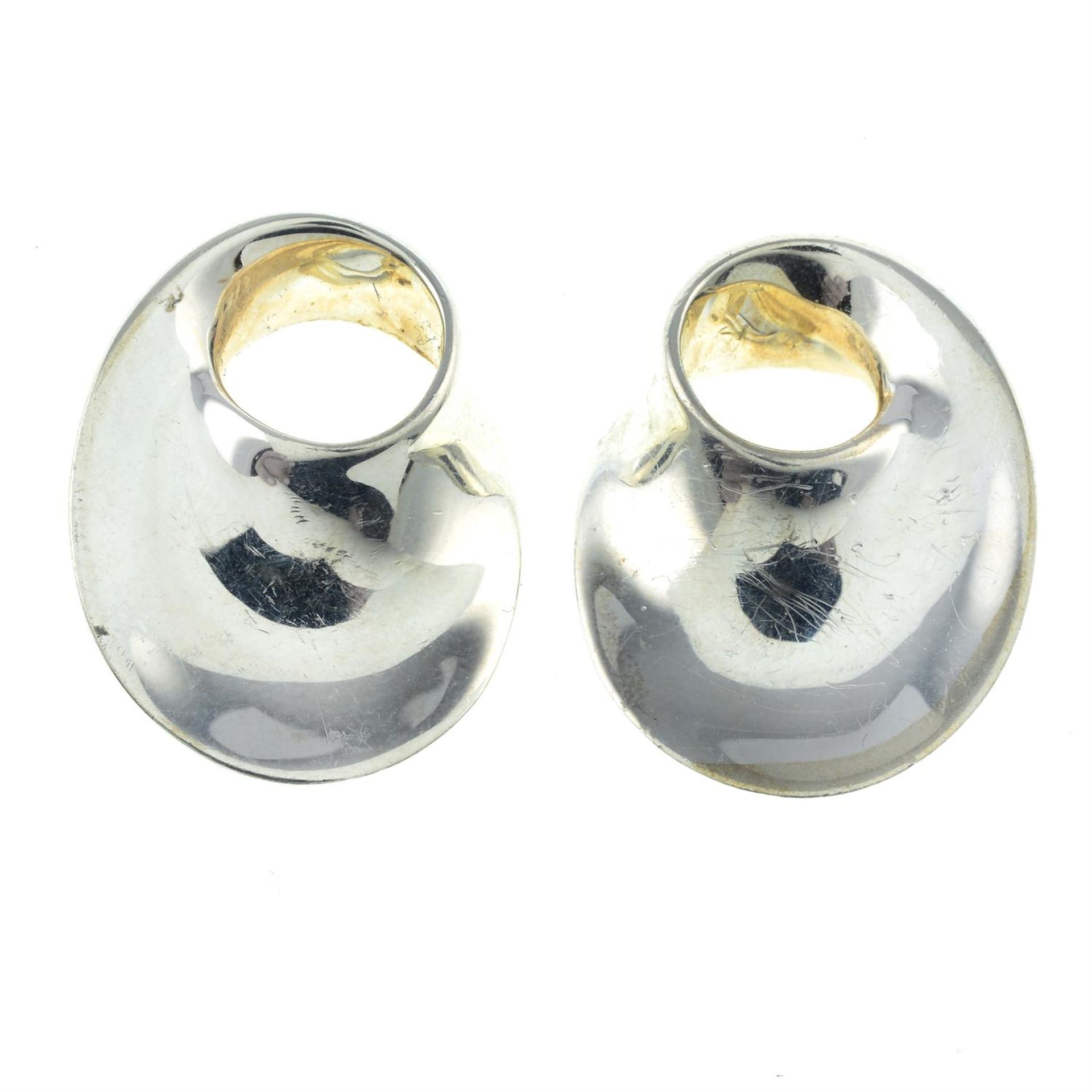 A pair of silver 'Mobiuis' earrings, by Georg Jensen.