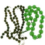A selection of green resin beads.