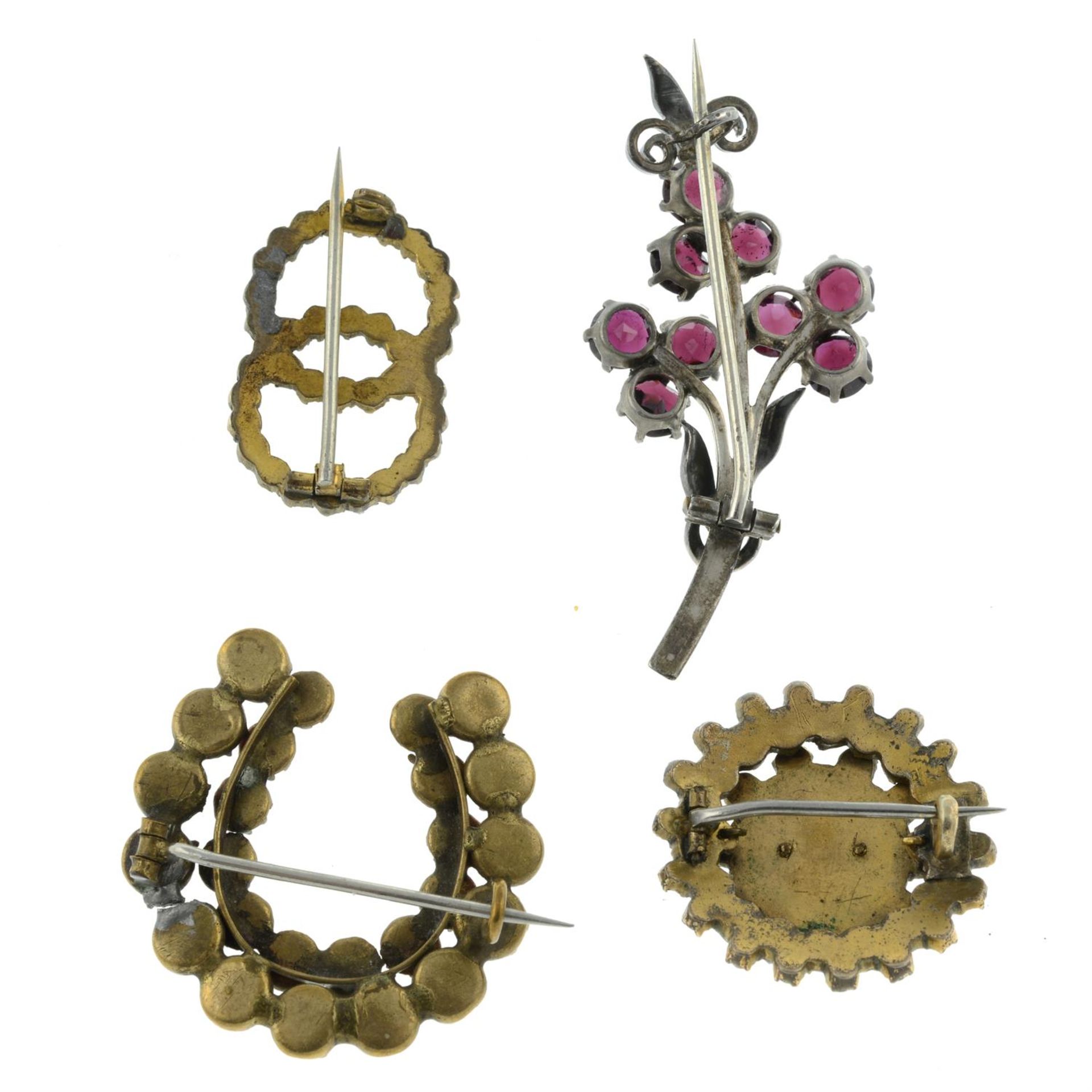 Four Victorian garnet brooches, to include a garnet and split pearl floral bouquet brooch. - Image 2 of 2