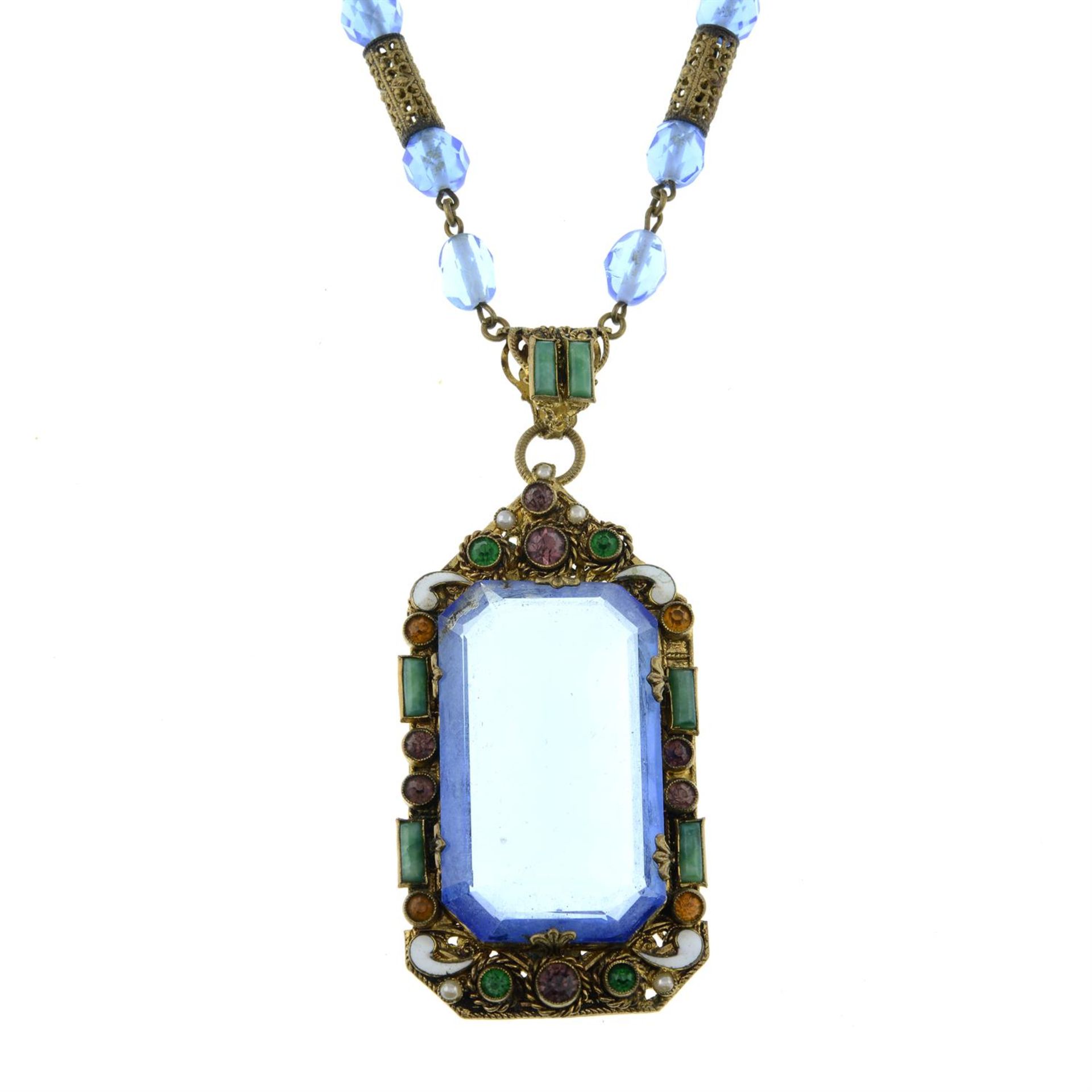 An early 20th century continental paste pendant, on an integral chain.