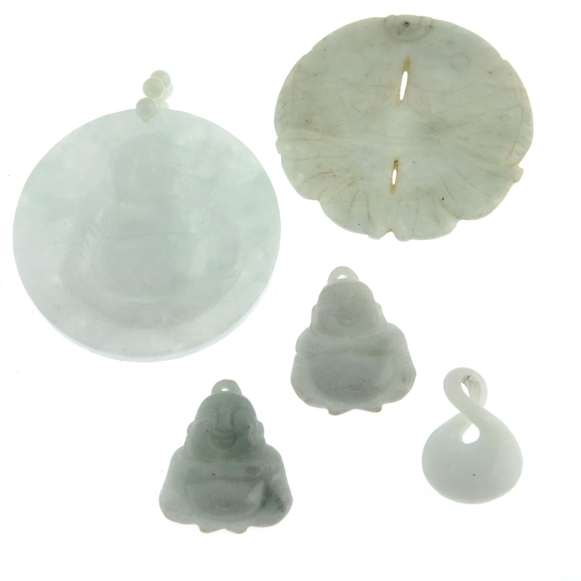 Five jade pendants.