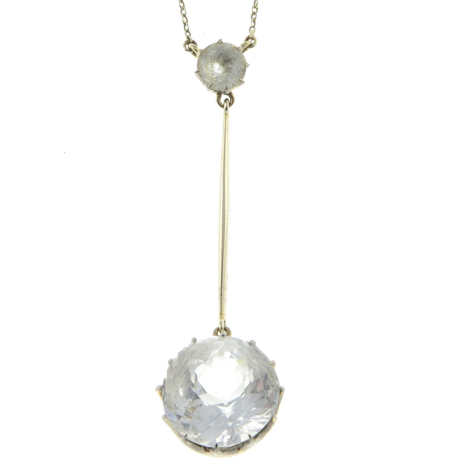 A mid 20th century 18ct gold rock crystal drop pendant, with integral chain.