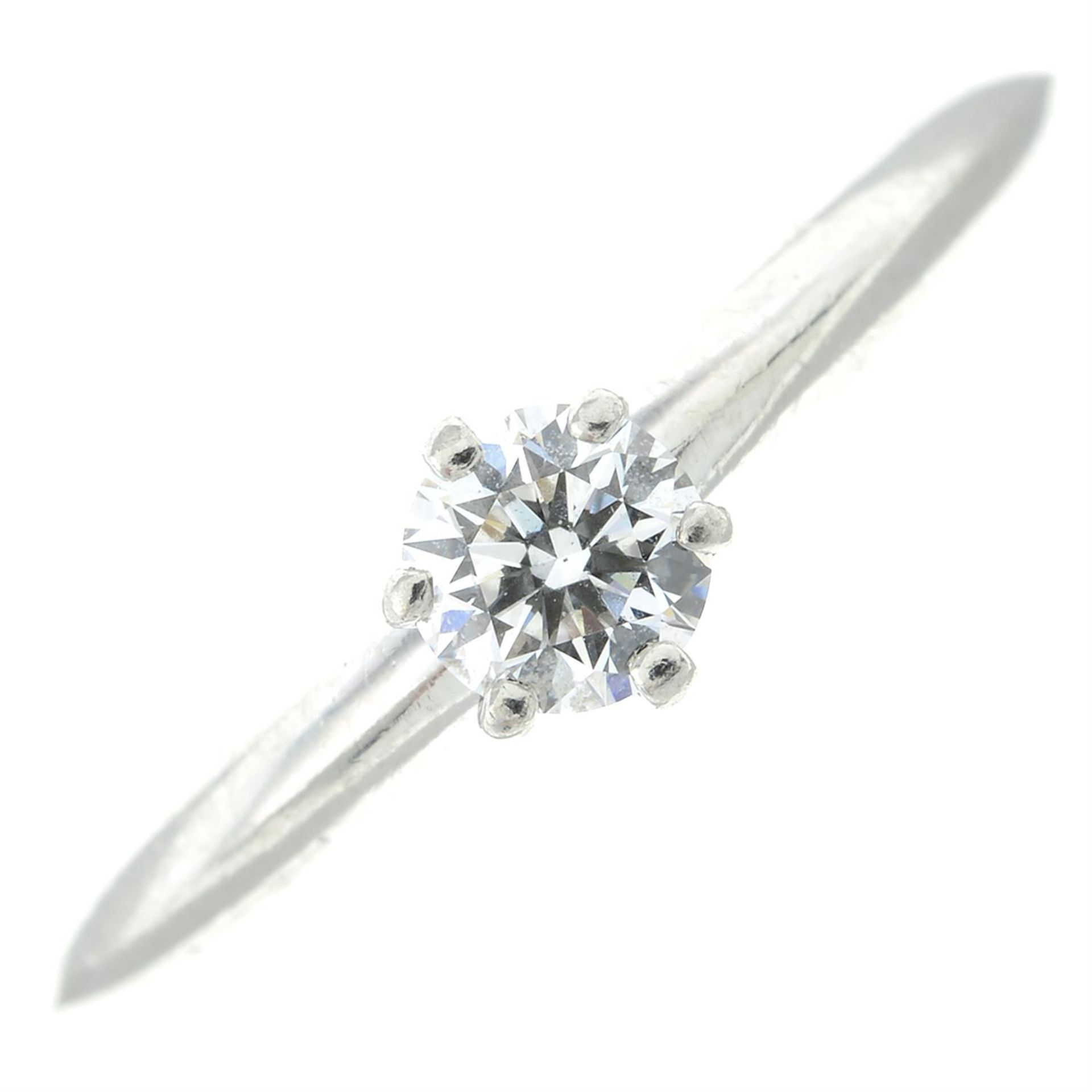 A platinum brilliant-cut diamond single-stone ring, by Tiffany & Co.