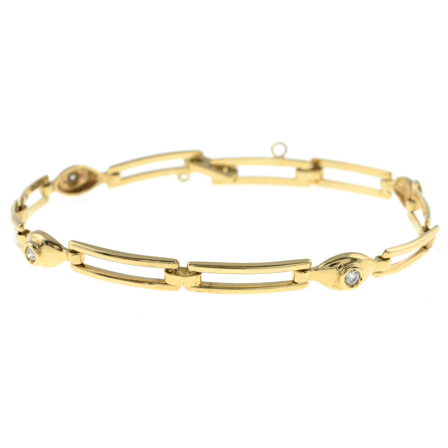 A fancy-link bracelet, with brilliant-cut diamond spacers.