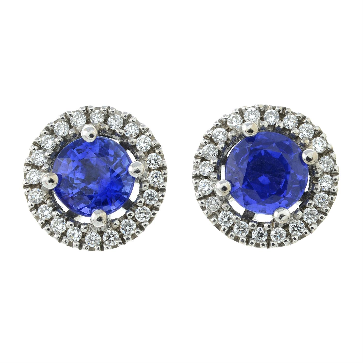 A pair of 18ct gold sapphire and brilliant-cut diamnd cluster stud earrings.