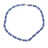 A lapis lazuli bead single-strand necklace.