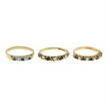 Three 9ct gold sapphire and cubic zirconia half-eternity rings.