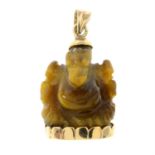 A carved tiger's-eye elephant pendant.