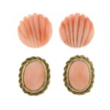 Two pairs of coral earrings.