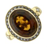 An early 20th century 18ct gold oval-shape citrine and split pearl cluster ring, with split pearl