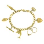 A 9ct charm bracelet, suspending seven charms.