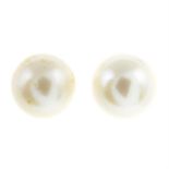 A pair of cultured pearl earrings.