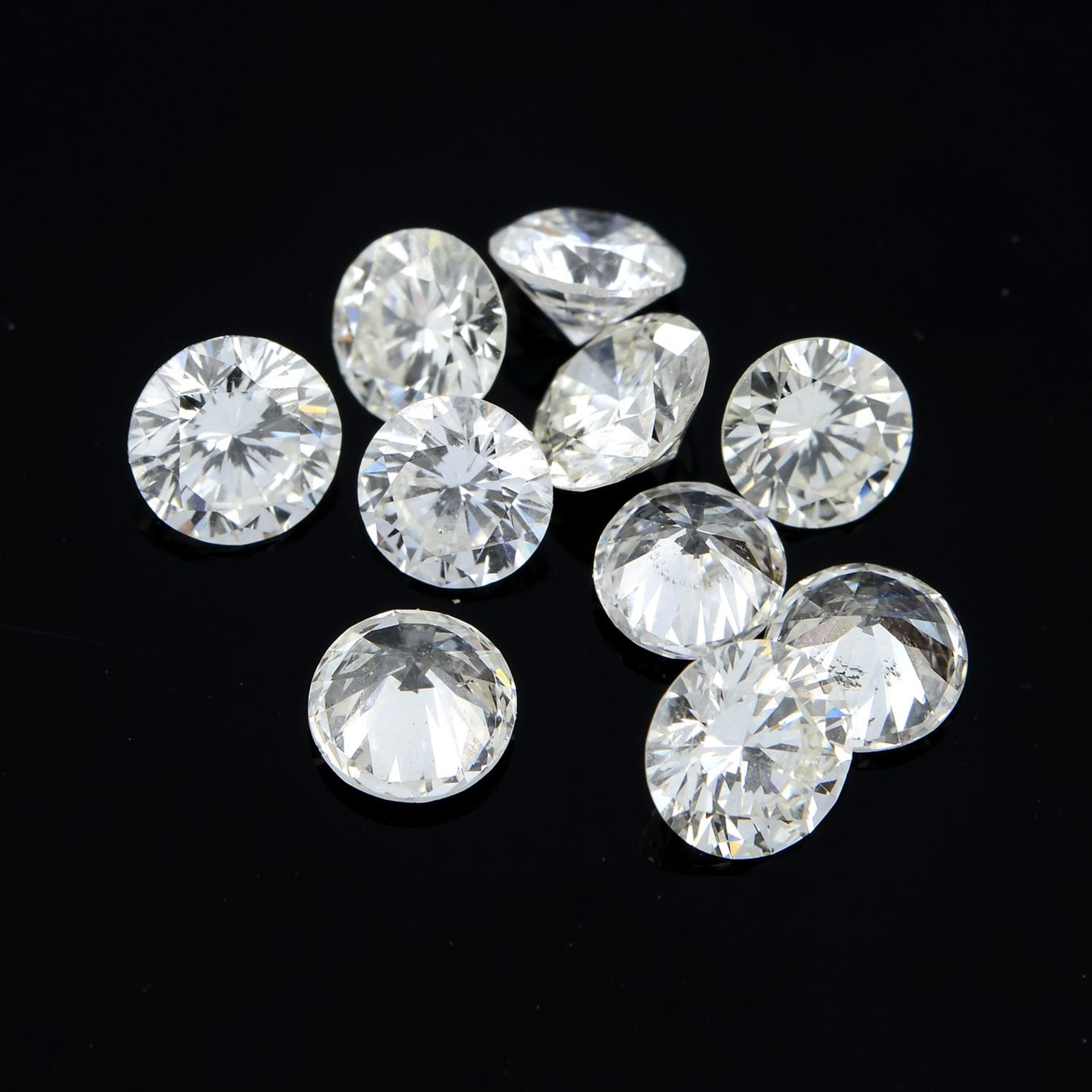 A selection of ten vari-cut diamonds, total weight 2.94cts.