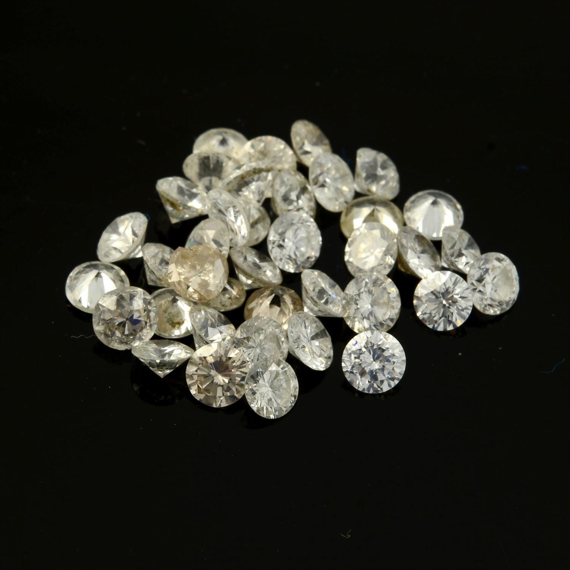 A selection of vari-cut diamonds, total weight 6.16cts. average approximately 0.17ct.