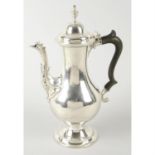 A George III silver coffee pot by Hester Bateman.