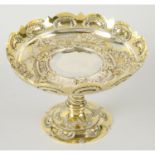 A late Victorian silver-gilt tazza dish.