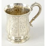 An early Victorian silver christening mug.