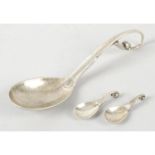 A Georg Jensen No. 21 pattern ladle & two miniature examples. (3).