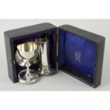An early 20th century silver matched travelling communion set.