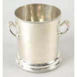 An Edwardian silver wine cooler.