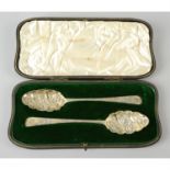 A matched pair of George III silver spoons, in fitted case.